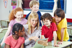 teacher reading a story to her students