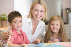 teacher and her students smiling